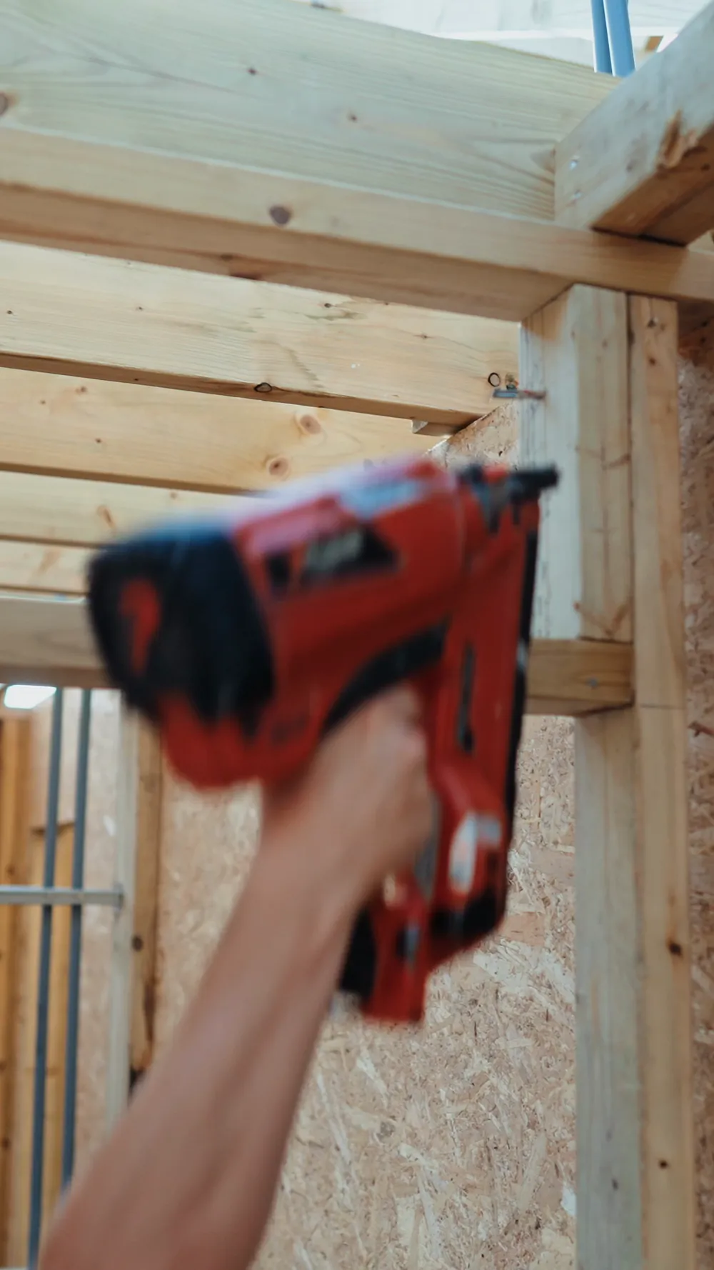 A Build and Co carpenter fixing the frame